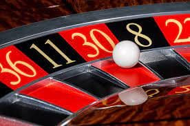 surgadewa slot live-dealer studio with multiple camera angles and dealers at blackjack table